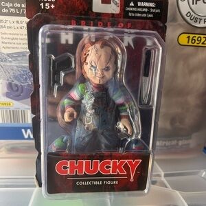 2015 Mezco Toys Childs Play Bride of CHUCKY Scars 5” Action Figure 
New